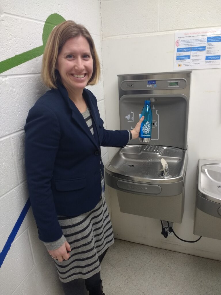 French club sells water bottles for a cause