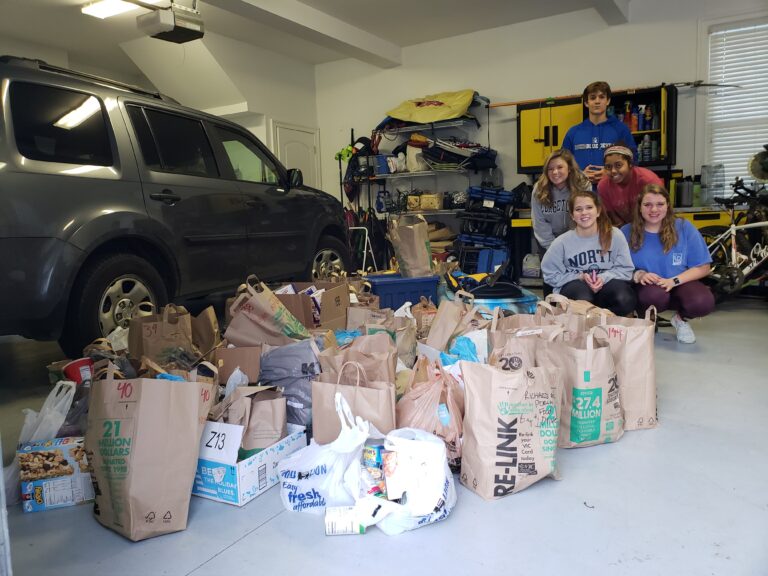 Students donate hundreds of items in Thanksgiving food drive