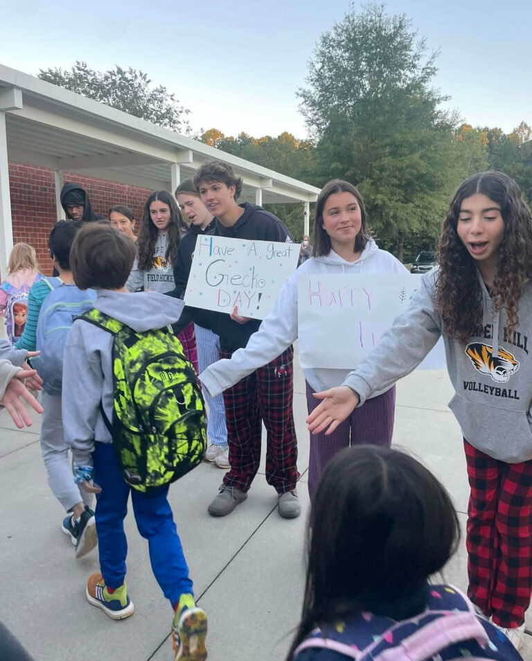 Tiger athletes brighten Morris Grove Elementary School students’ morning 